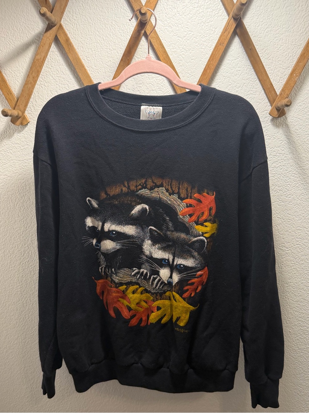 Vintage Delta Black Crewneck Sweater with Raccoon & Autumn Leaf Graphic